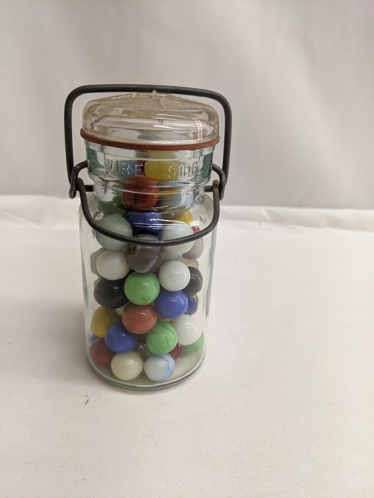 Vintage Marbles In Wire Lock Mason Jar 5 1/4″ x 2 1/2″ Lot of 67 Marbles LW