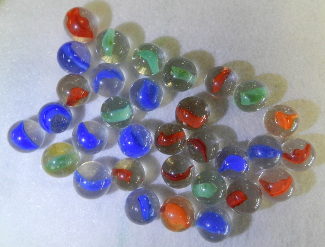 #20944m Vintage Group or Lot of 30 Peltier Glass Banana Cat’s Eye Marbles