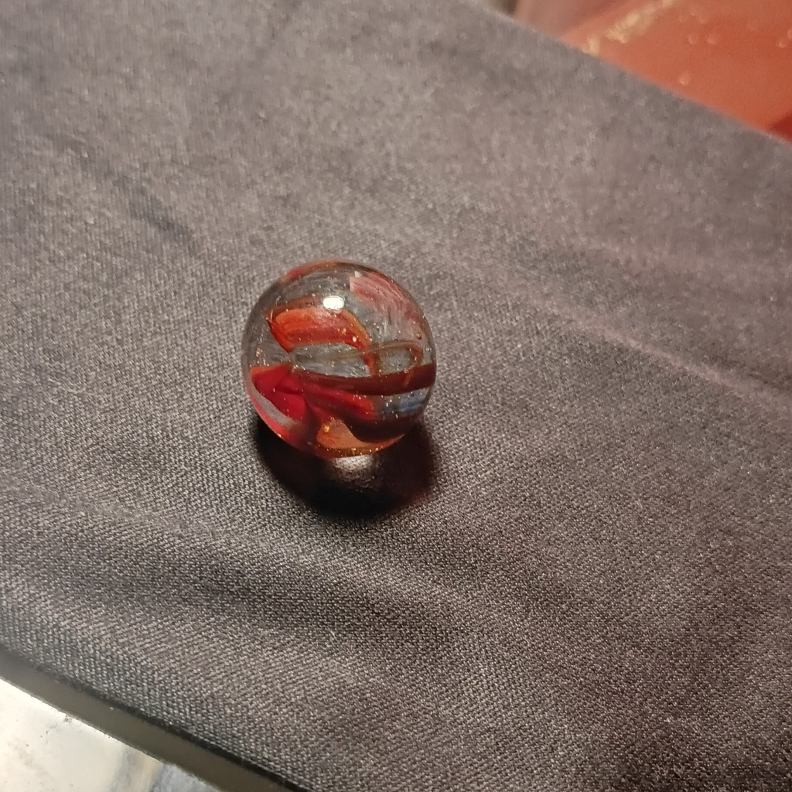 Single Machine Made Clear Glass Swirl Toy Marble, Red & Black Ribbons, Ages 4+