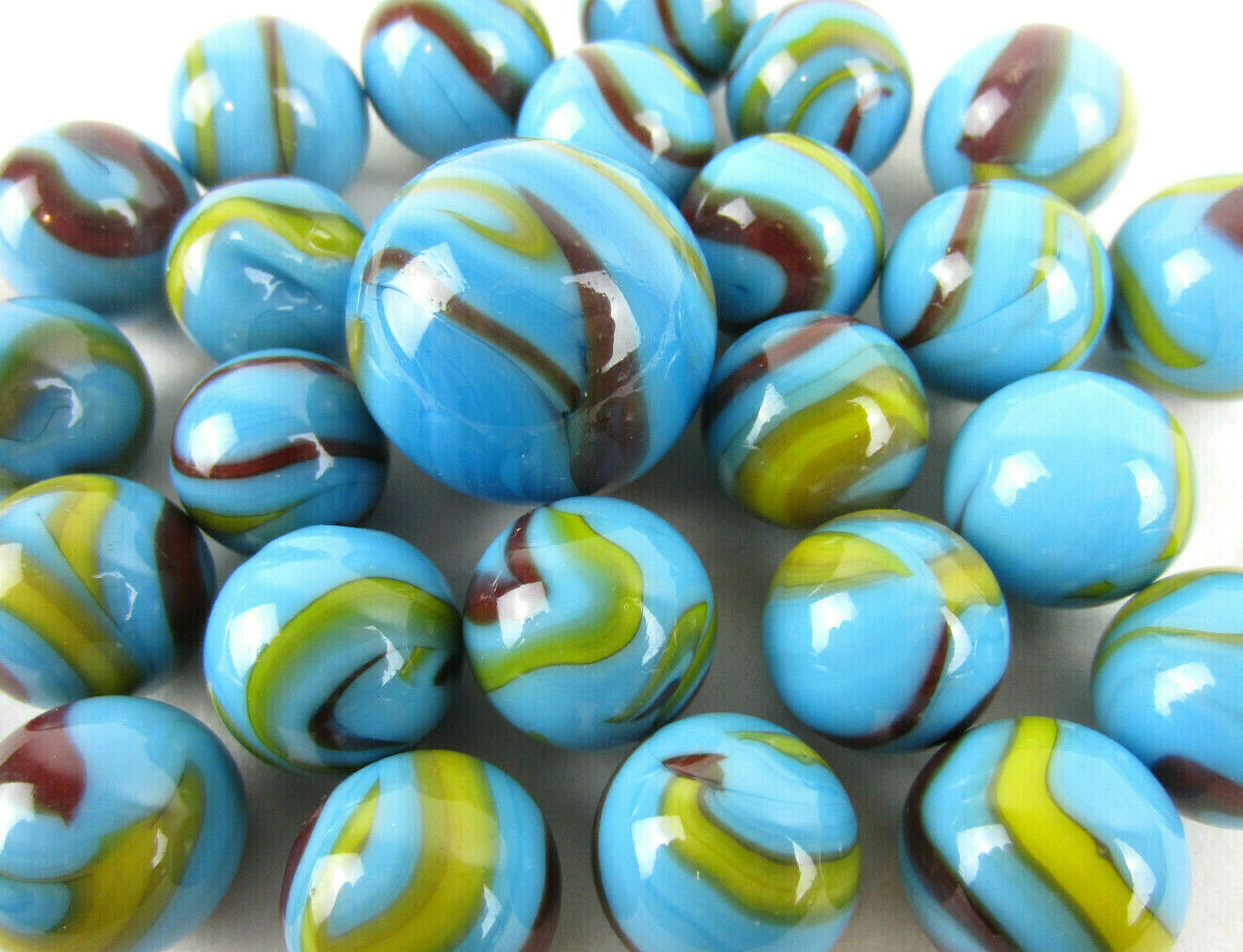 25 Glass Marbles SERPENT Blue/Red/Yellow superman colors Shooter vtg style Swirl