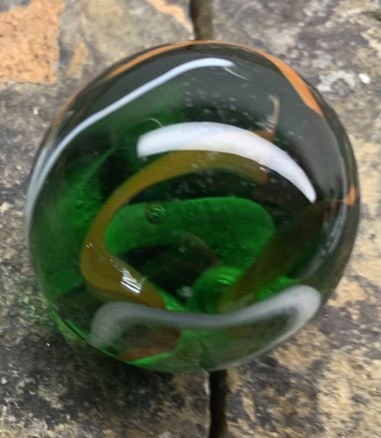 Glass Marble 1.5” In Diameter. Used. Green With Swirls