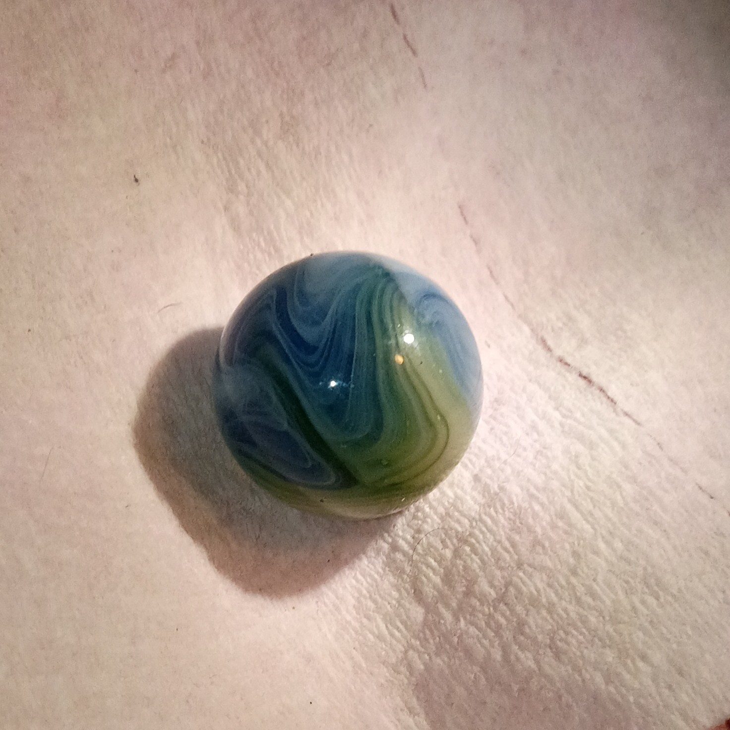 Blue, Green, and White Swirl Machine Made Toy Marble for Ages 17 Years & Up