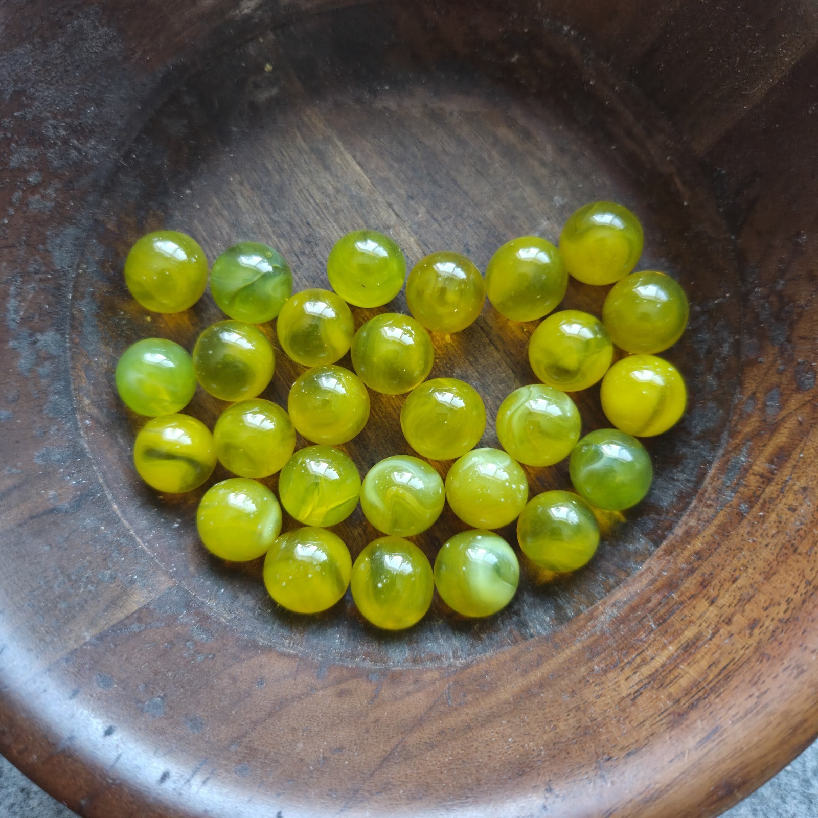 lot of 27 Translucent Snotty Mustard Yellow Swirl Marbles 5/8″