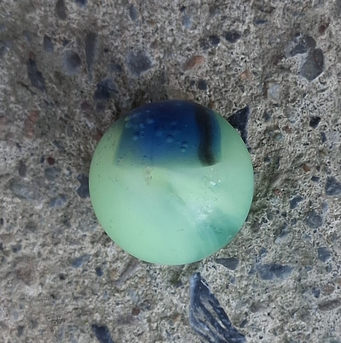 KokomoOpalescent Glass Rainbo Marble .60 BRIGHT Uv!! VHTF Example Beach Glass