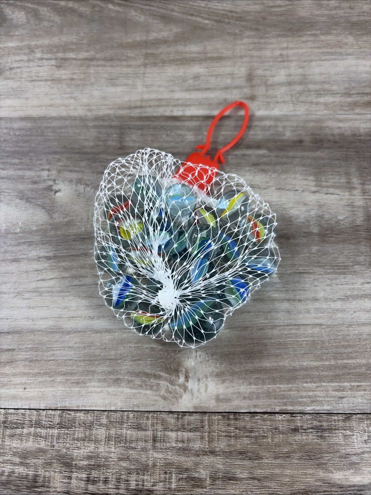 BOX OF 36 glass marble sets – netted bag of Approx 21 assorted marbles