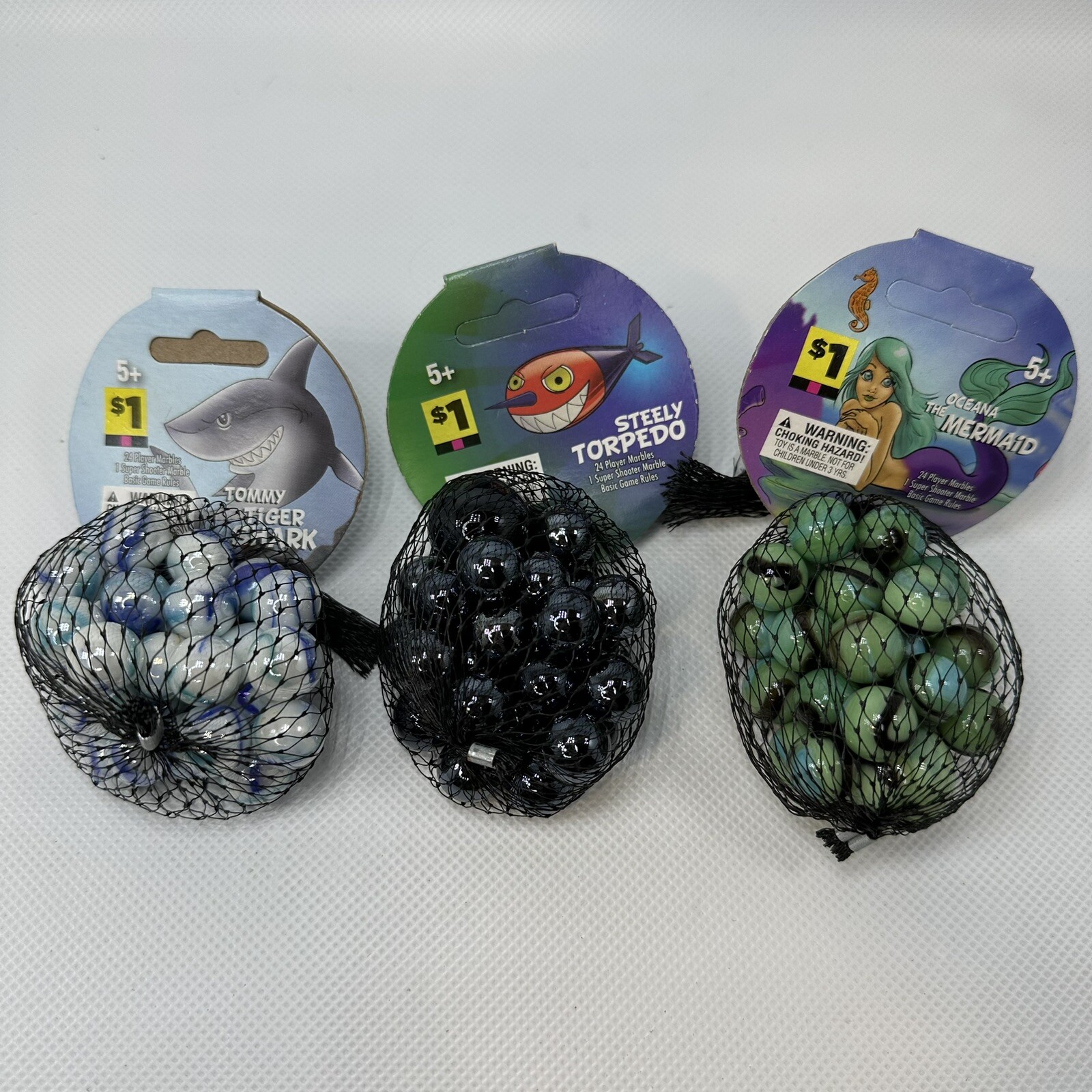 (3) Bags of Brand New Marbles- Torpedo, Mermaid, Shark 75ct