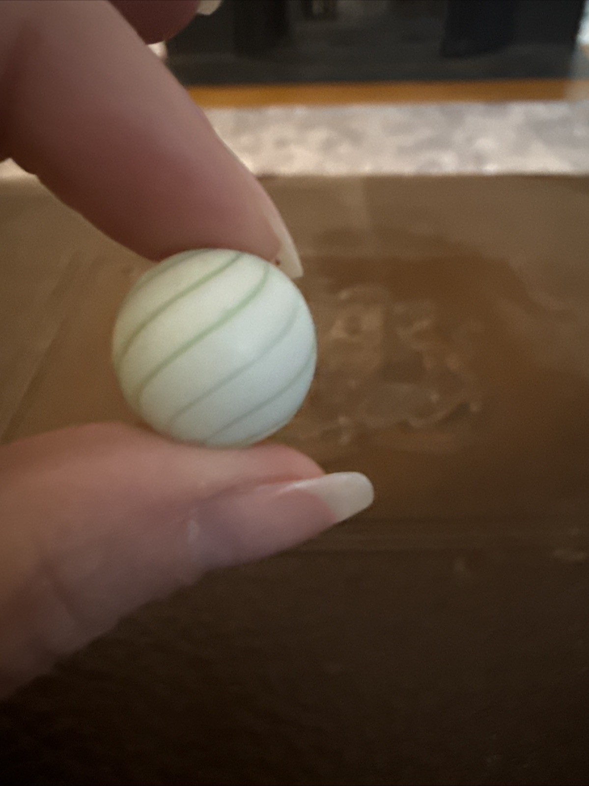 Clambroth Marble Opaque white base w/ green bands. Germany, 1860-1920. 3/4”