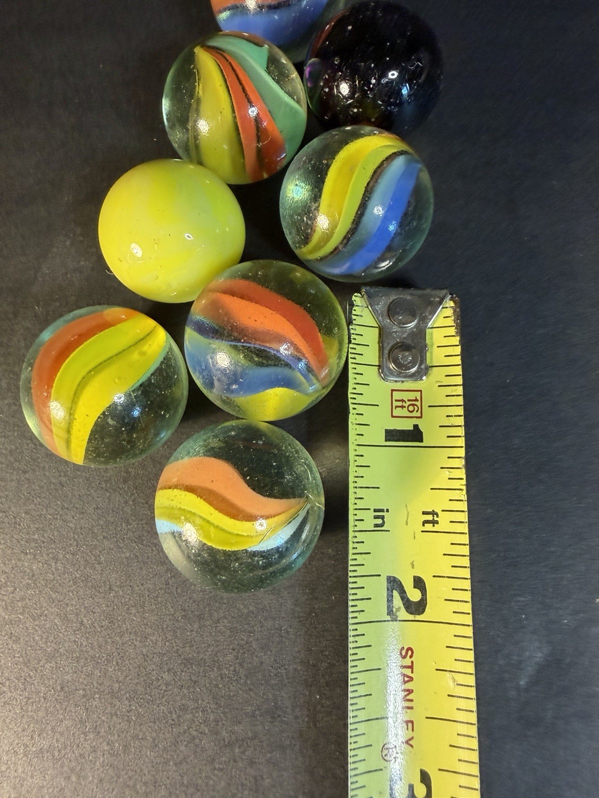 6 Cats Eye 1” Shooter Marbles Plus Two Other Solid Color Marbles