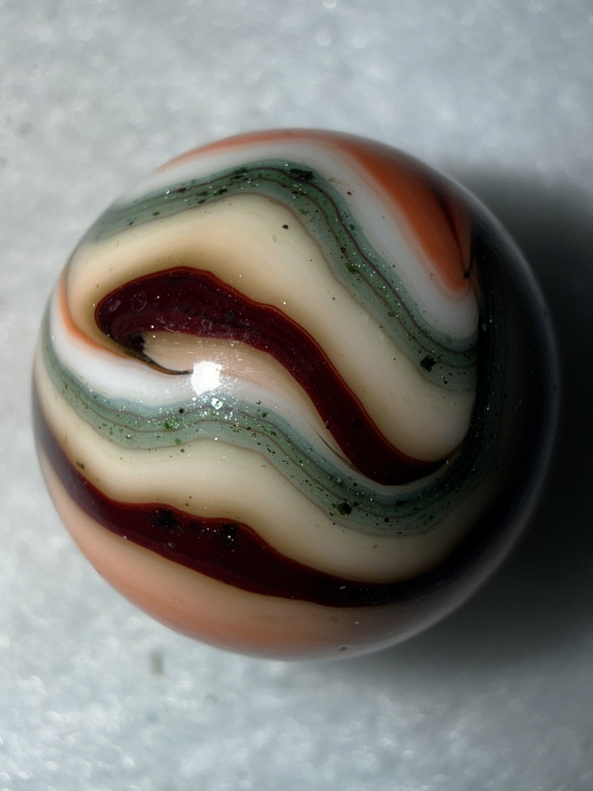 JABO Joker 1 (JERK) Collector Marble : Cranberry Apricot & Aventurine Swirl. .74