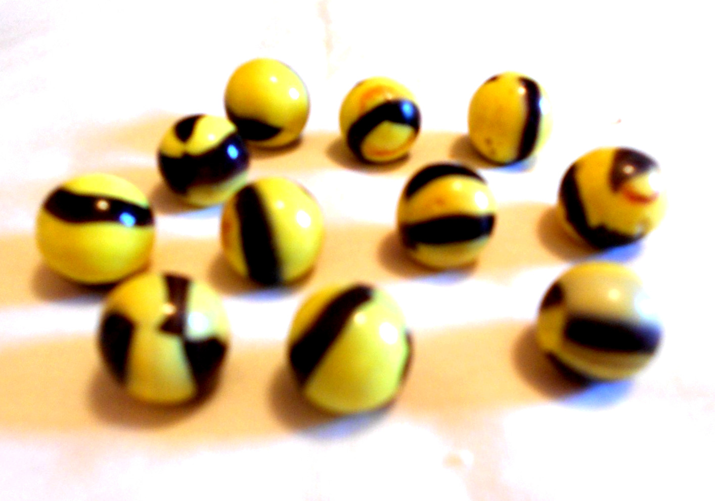 Vintage 11 Yellow Brown Red Streak Marbles, 1950-1960’s Two Sizes, Ungraded