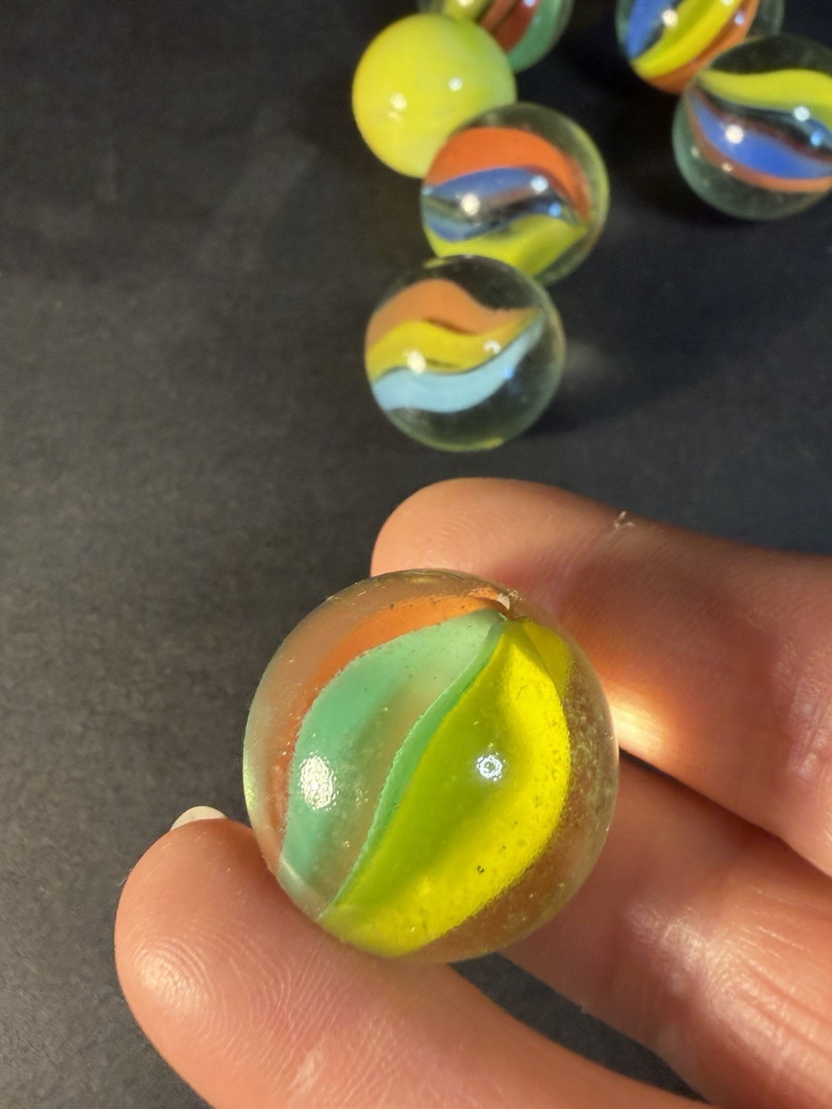 6 Cats Eye 1” Shooter Marbles Plus Two Other Solid Color Marbles