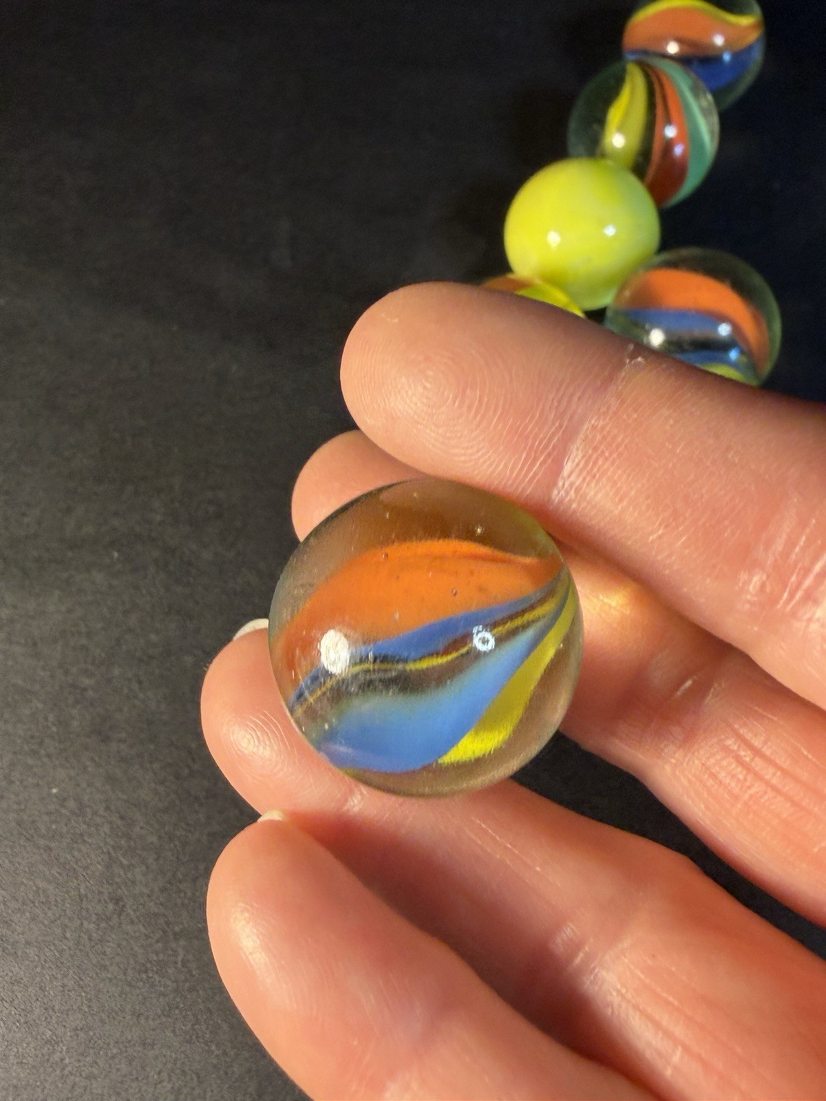 6 Cats Eye 1” Shooter Marbles Plus Two Other Solid Color Marbles