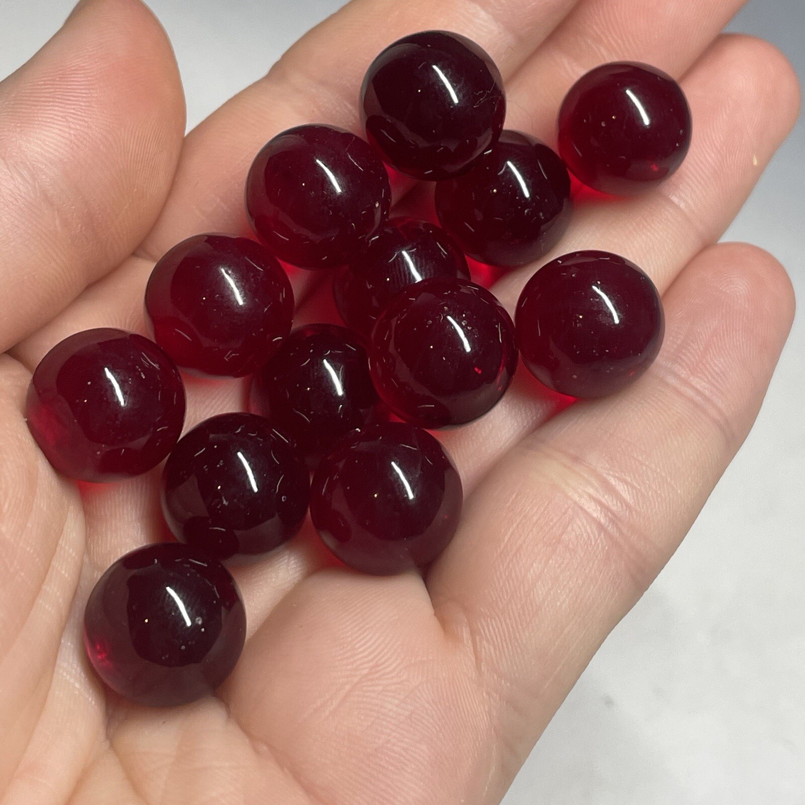 Lot of (13) Vintage Red UV Cadmium Orange Swirl Clear Glass Marbles