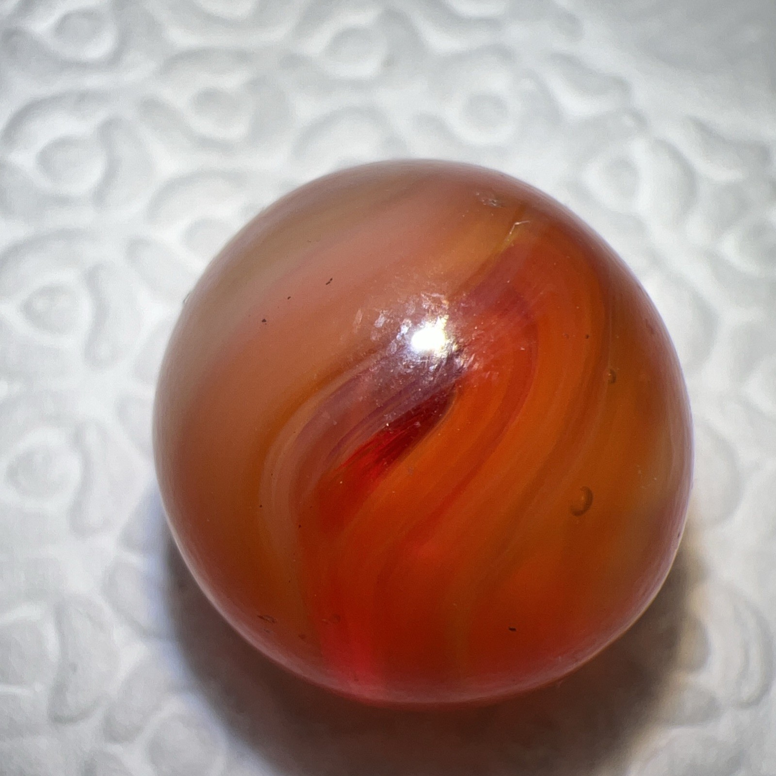 Vintage Peltier K & M Or Red Zebra Marble. Measures .50 Near Mint Condition.