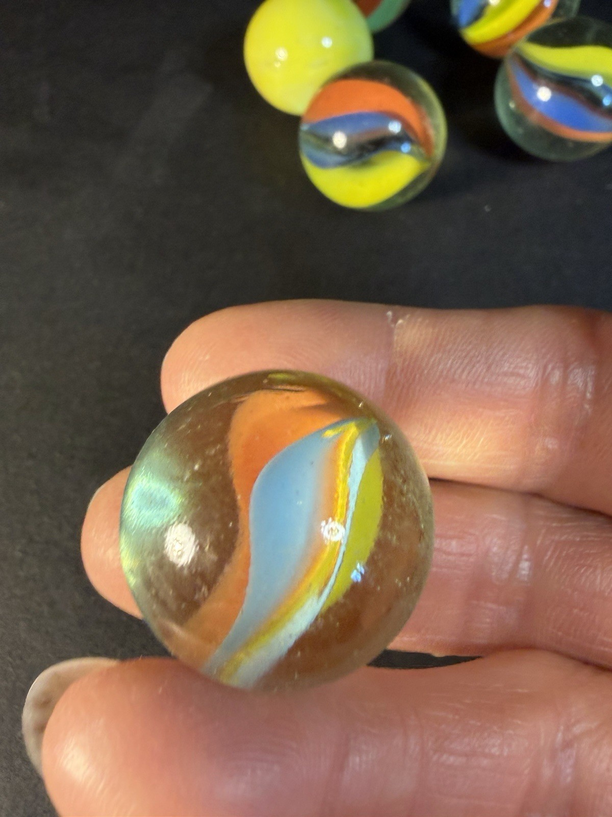6 Cats Eye 1” Shooter Marbles Plus Two Other Solid Color Marbles