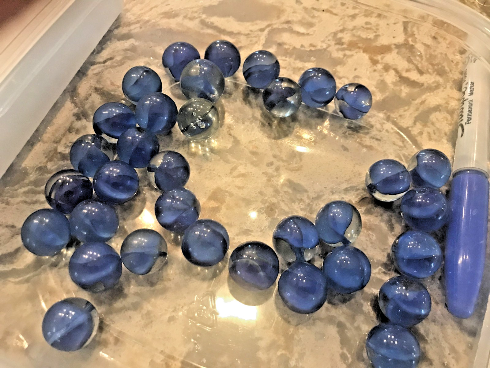3 bags of 16mm red, blue, light blue and red cat eyes marbles. buy 1,2,or 3 bags