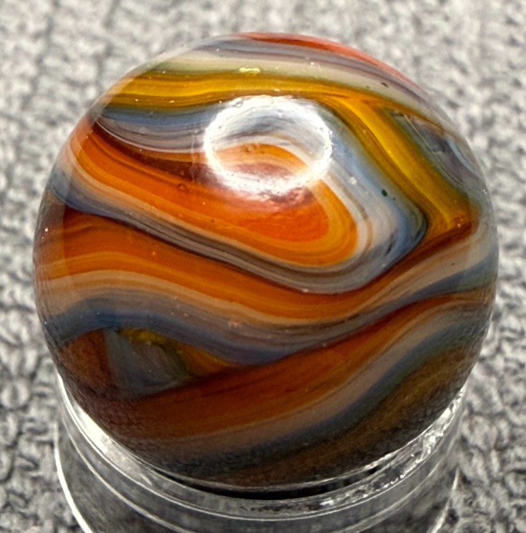 JABO / DAS .63″ Mint UV Glows Oxblood Orange Blue Yellow Swirl Marble (274)