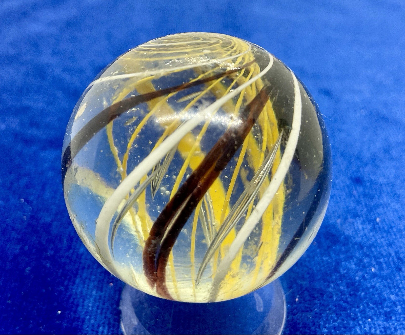 A vintage German Handmade Yellow Latticinio Marble. Measures 1.59 “ Near Mint.