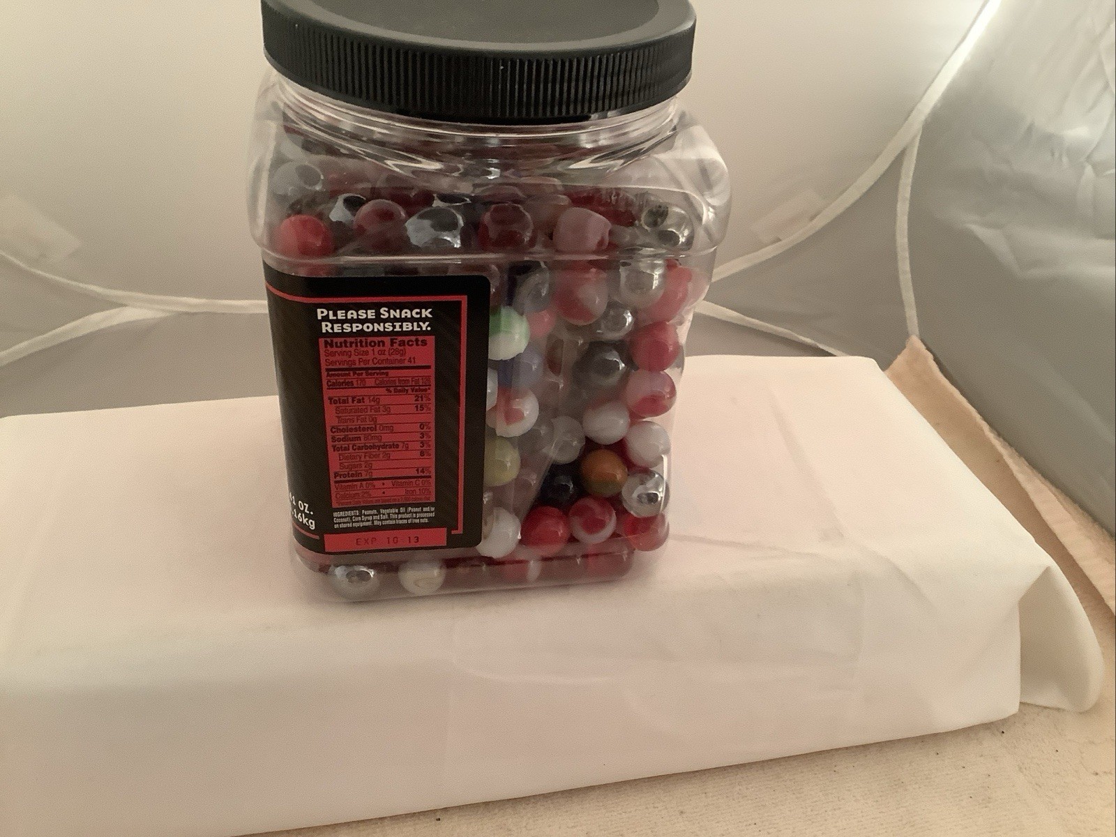 Plastic Bottle filled With A Mixture Of Marbles Found In A Garage.