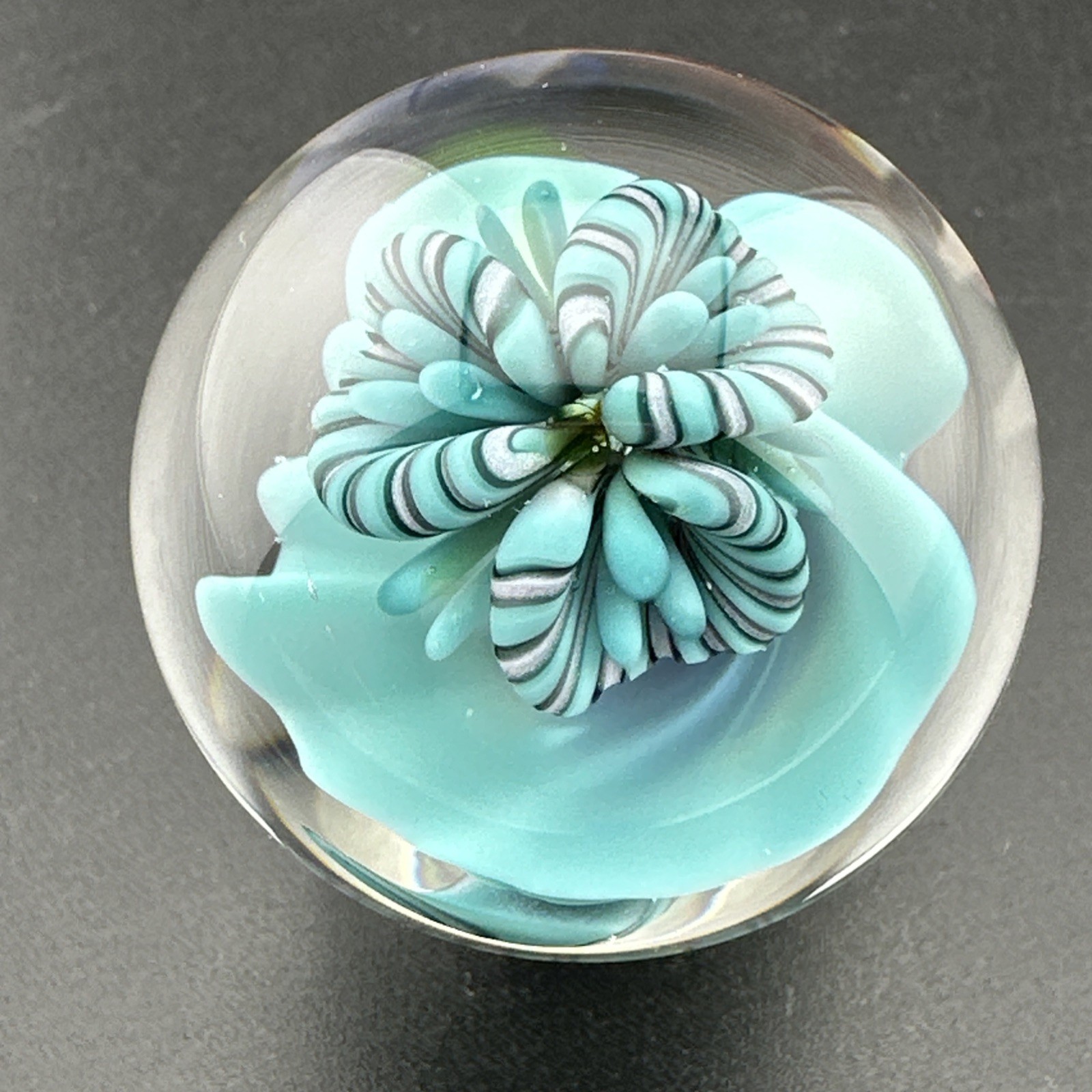 Contemporary Handmade Art Glass Marble 1.46″ Blue Monster, Flower, + UV Glow!