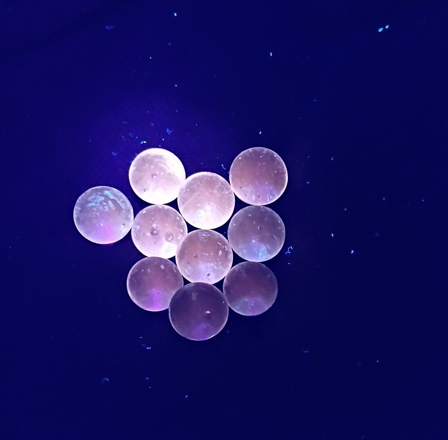 Lot of 10 Peewee Cadmium Light Orange UV Glow Marbles Clear Small