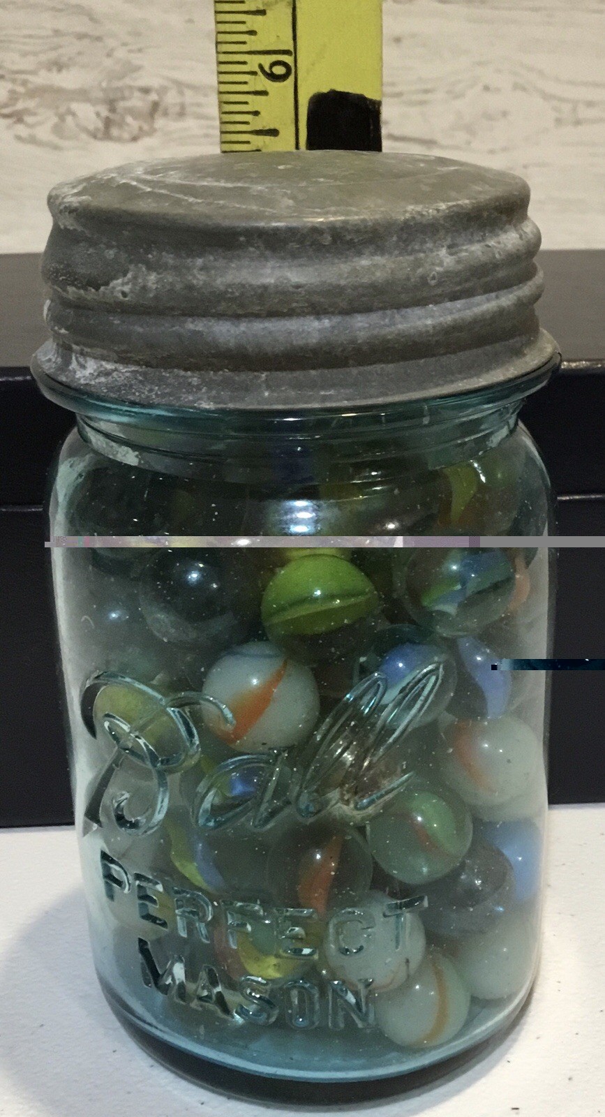 Antique Ball Perfect Mason jar, zinc lid, filled with assorted vintage marbles.