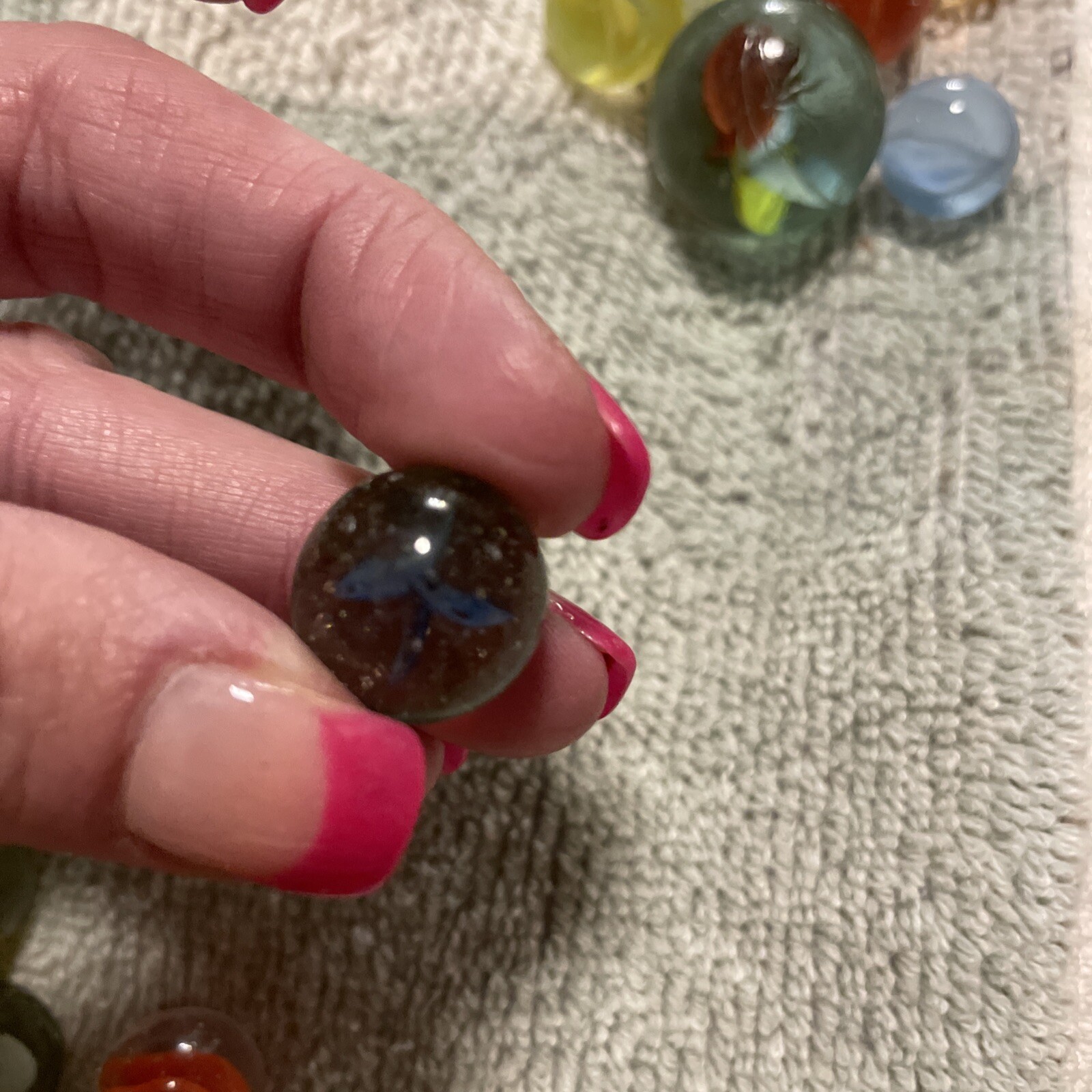 1930-1940’s cat eye 4 vein marbles. Total 12, 1 In, .75 , 10 .50
