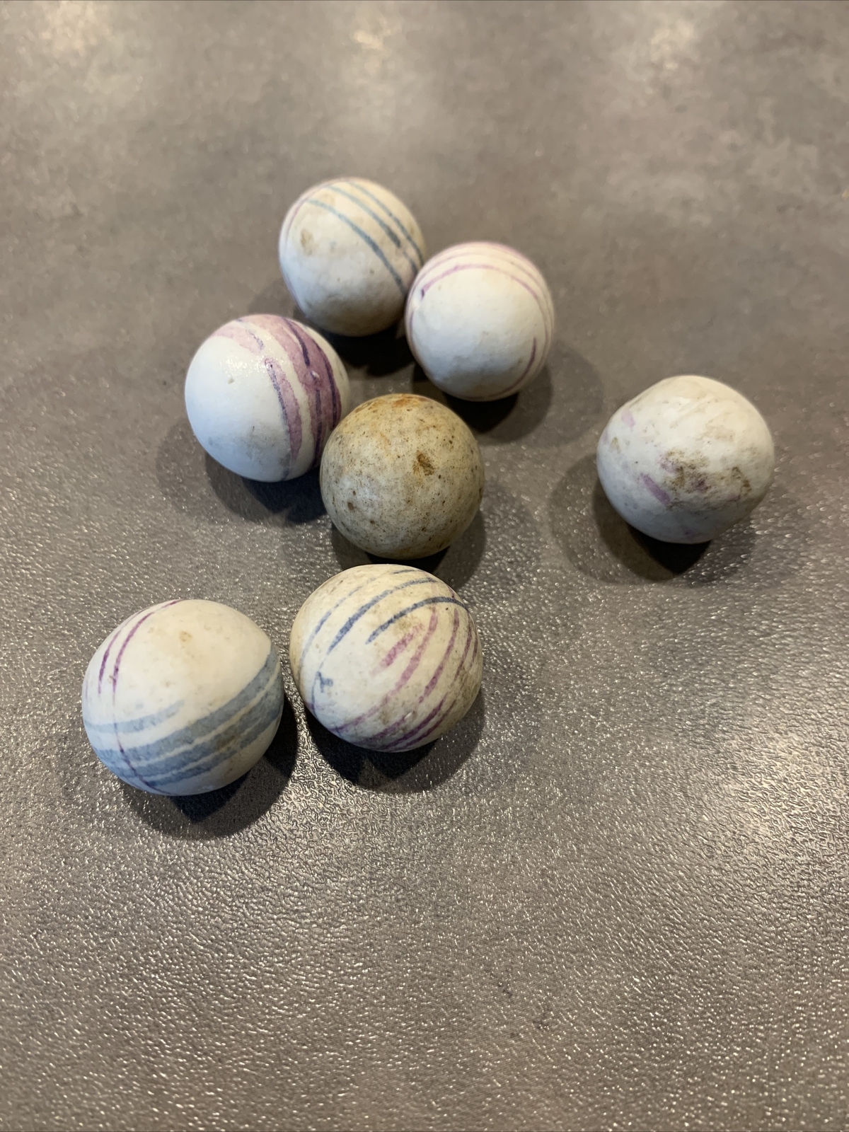 Old Lot of 7 German China Marbles Unglazed Helix Lined
