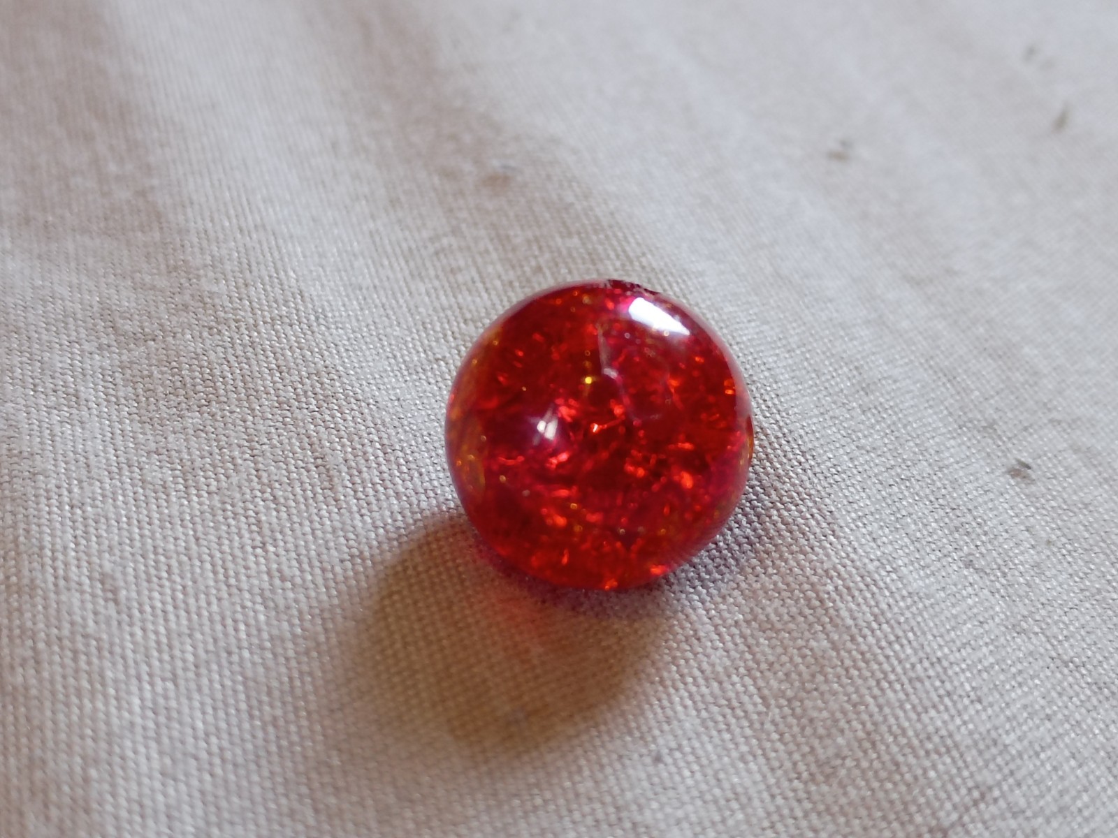 4 Vintage 1/2″ Red Crackle Glass with Cadmium Playing Marbles.
