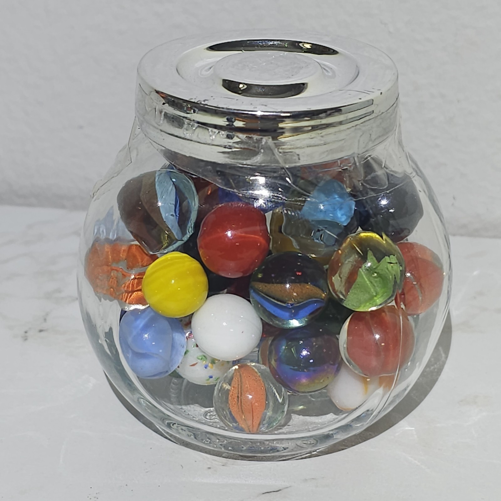 Glass Jar Of Vintage Marbles