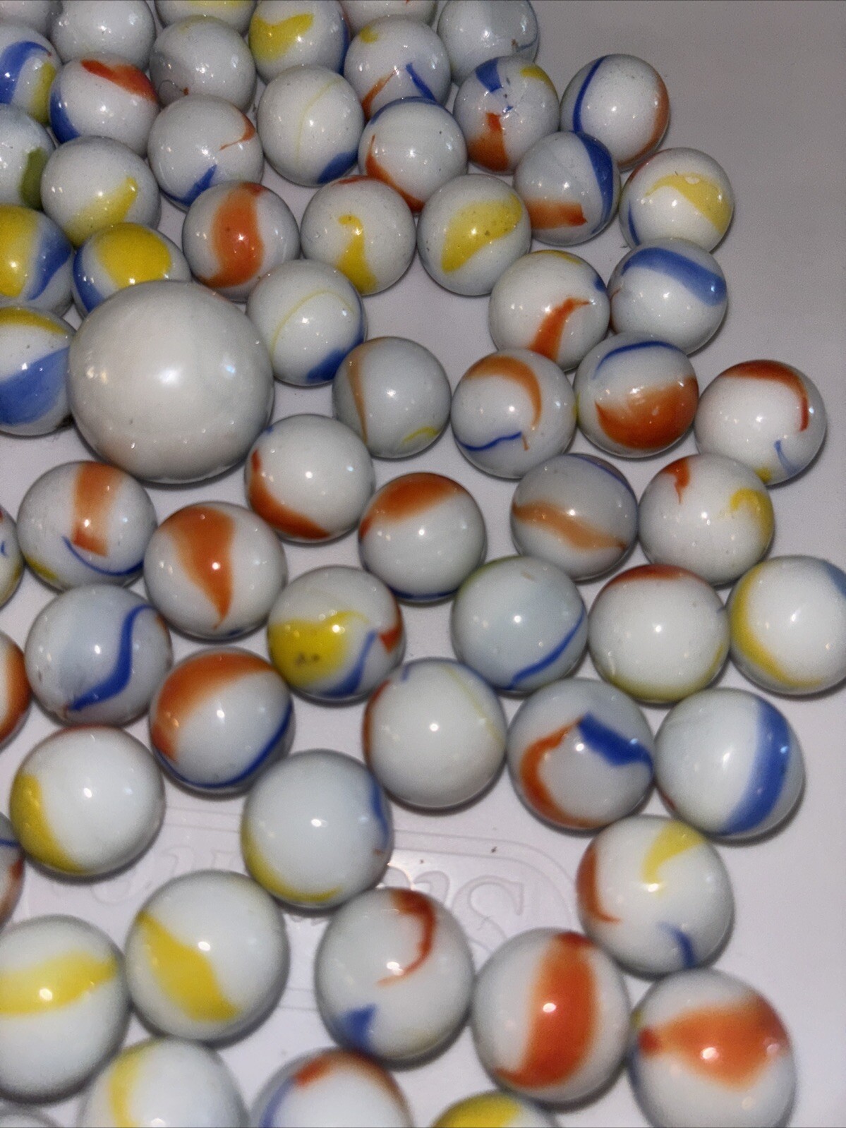 100+ Glass Marbles Opaque White Ribbon Swirls Blue Orange Yellow + White Shooter