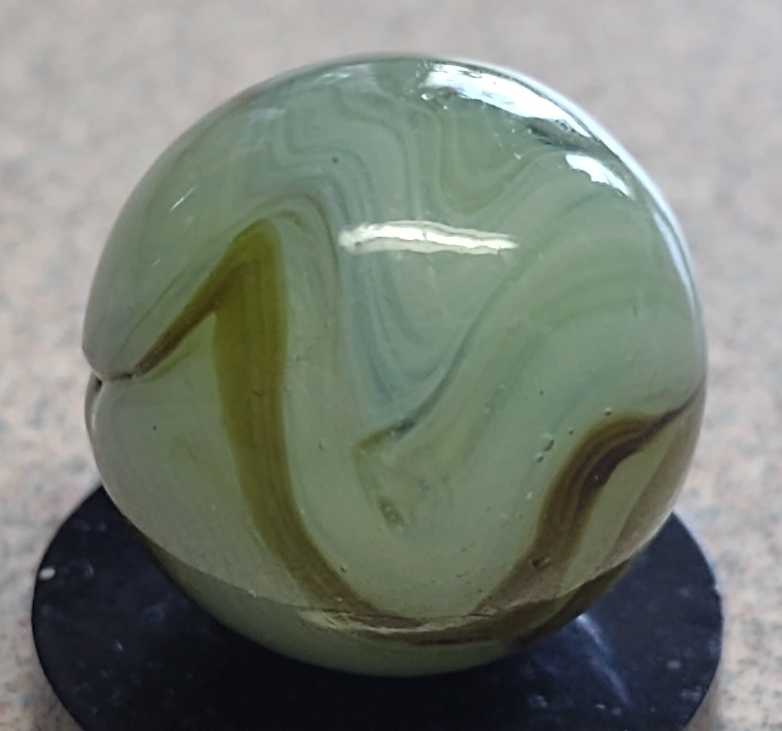 Heaton Agate Swirl marble-.63″ Near Mint+, Lt Green Transl. base-Brown swirl
