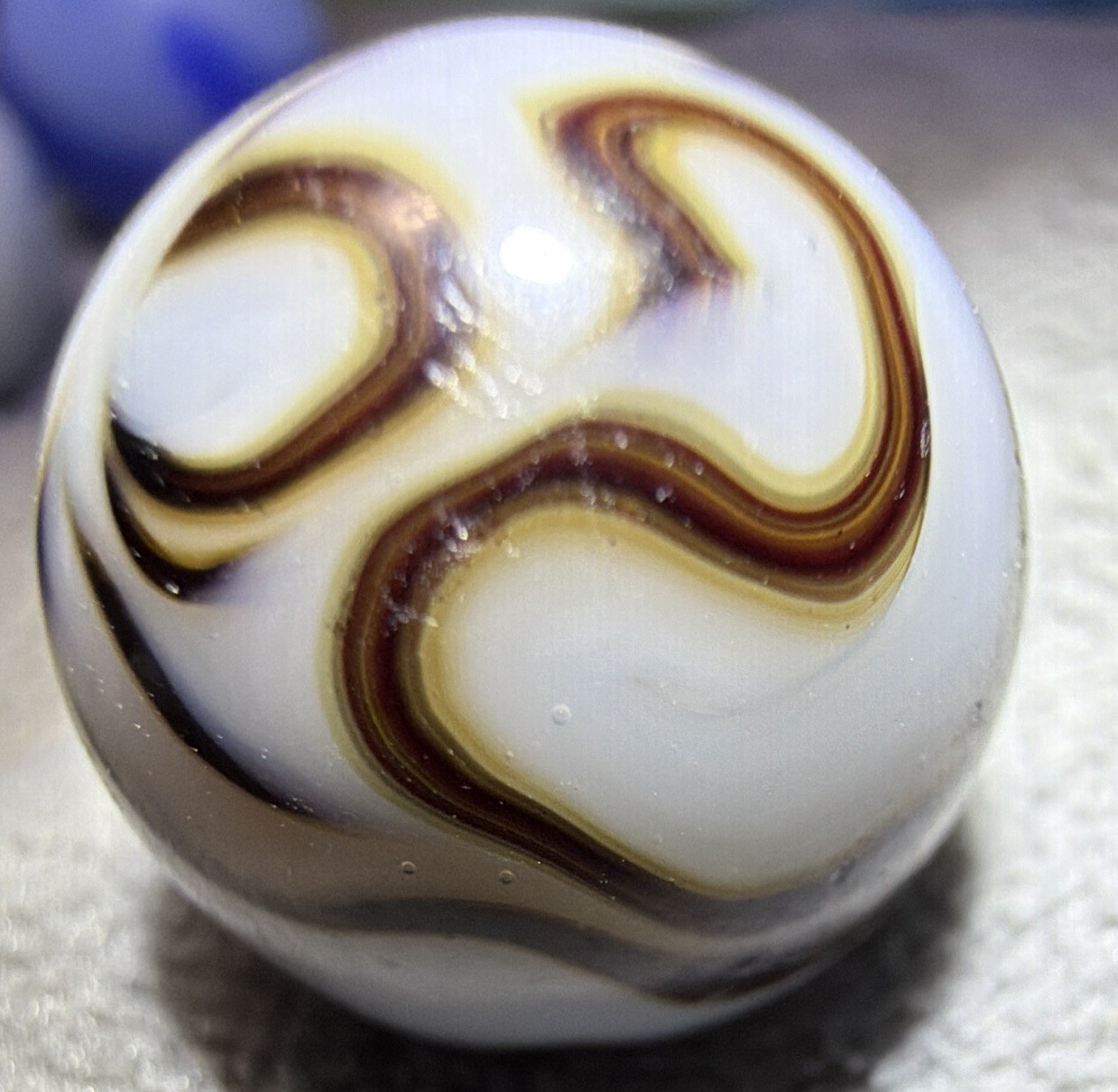 OxBlood on White Flame Swirl Ribbons UV Gold /Yellow Trim