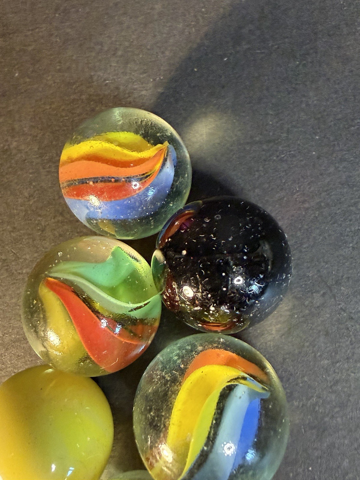 6 Cats Eye 1” Shooter Marbles Plus Two Other Solid Color Marbles