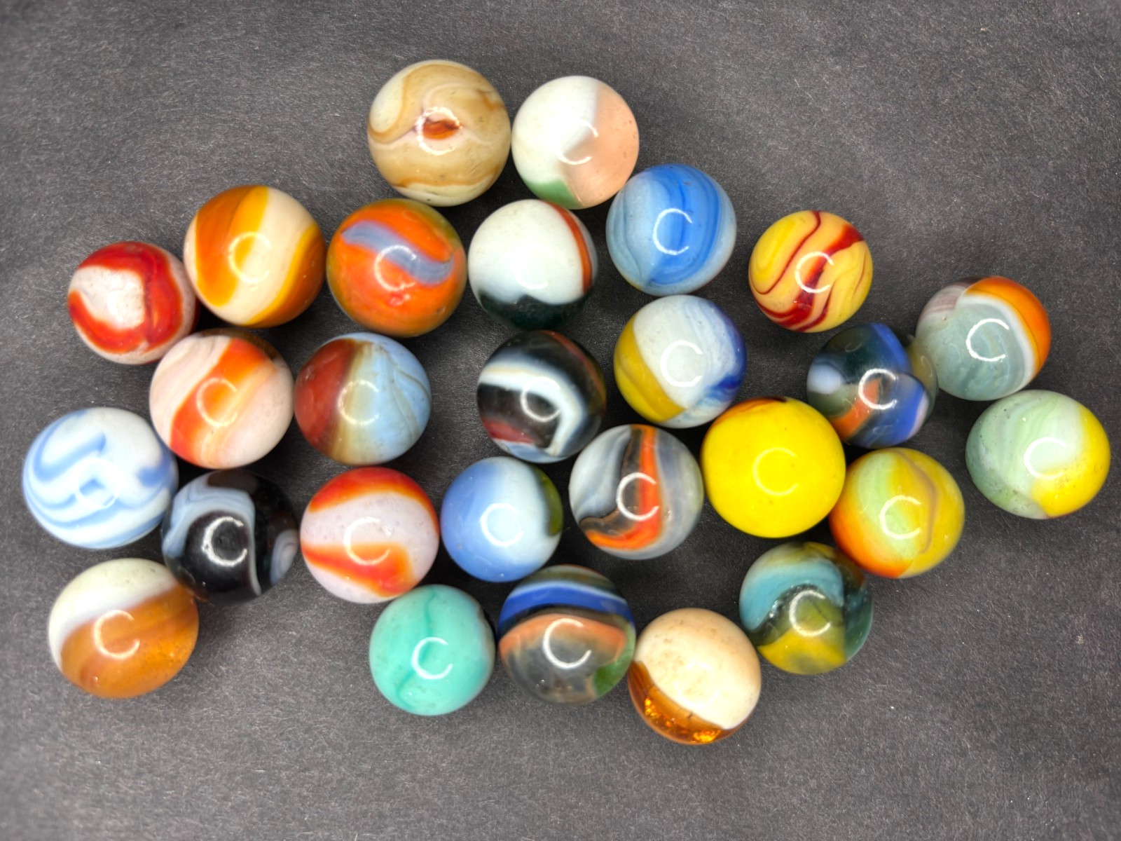 Akro Agate Peltier Vitro Marbles Lot 27 Corkscrew Oxblood .56-.66″ Multi Color