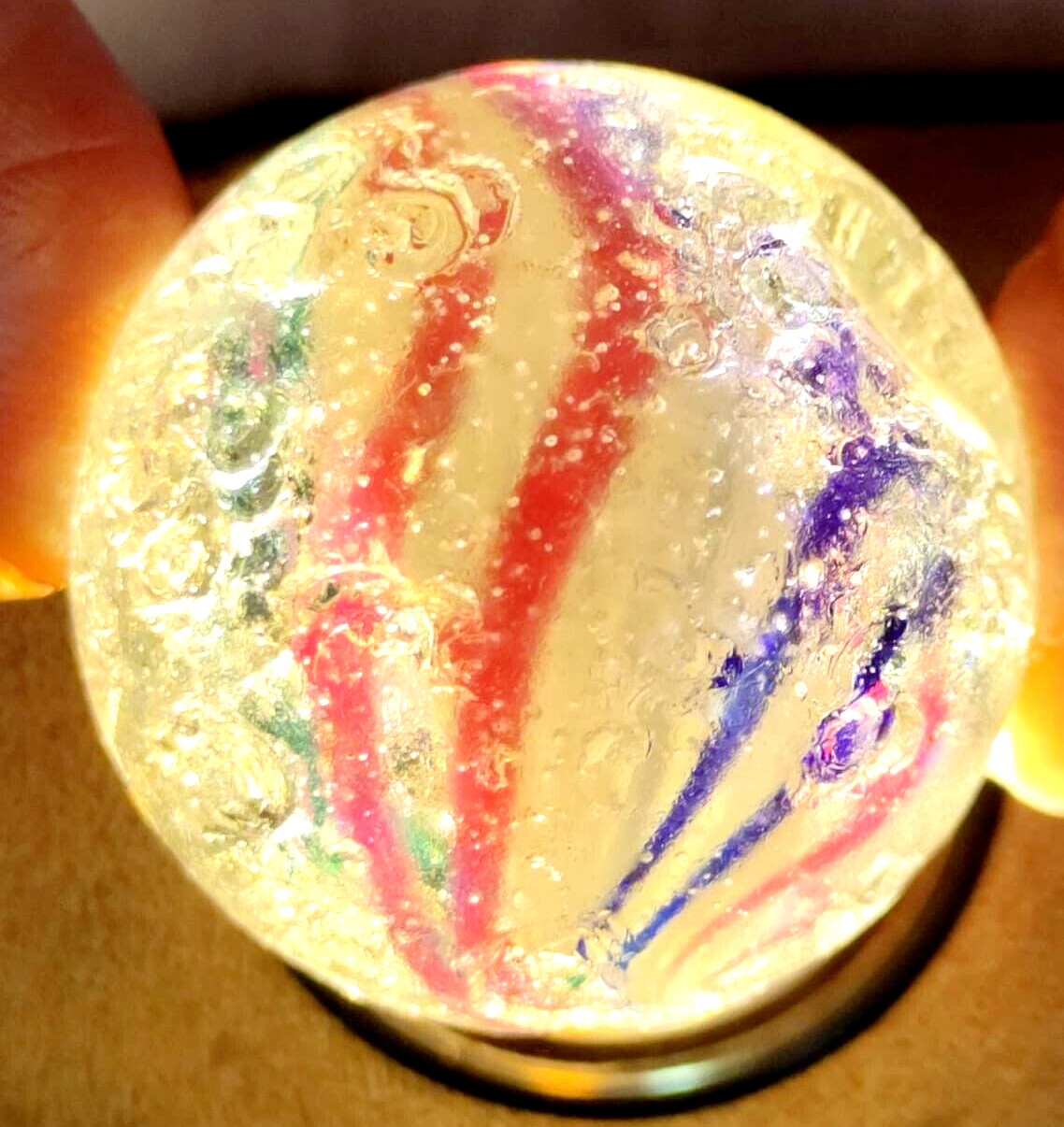 TOY MARBLE 1.1” marble trilevel ,solid core, 4 panel ribbon swirl, requ ground