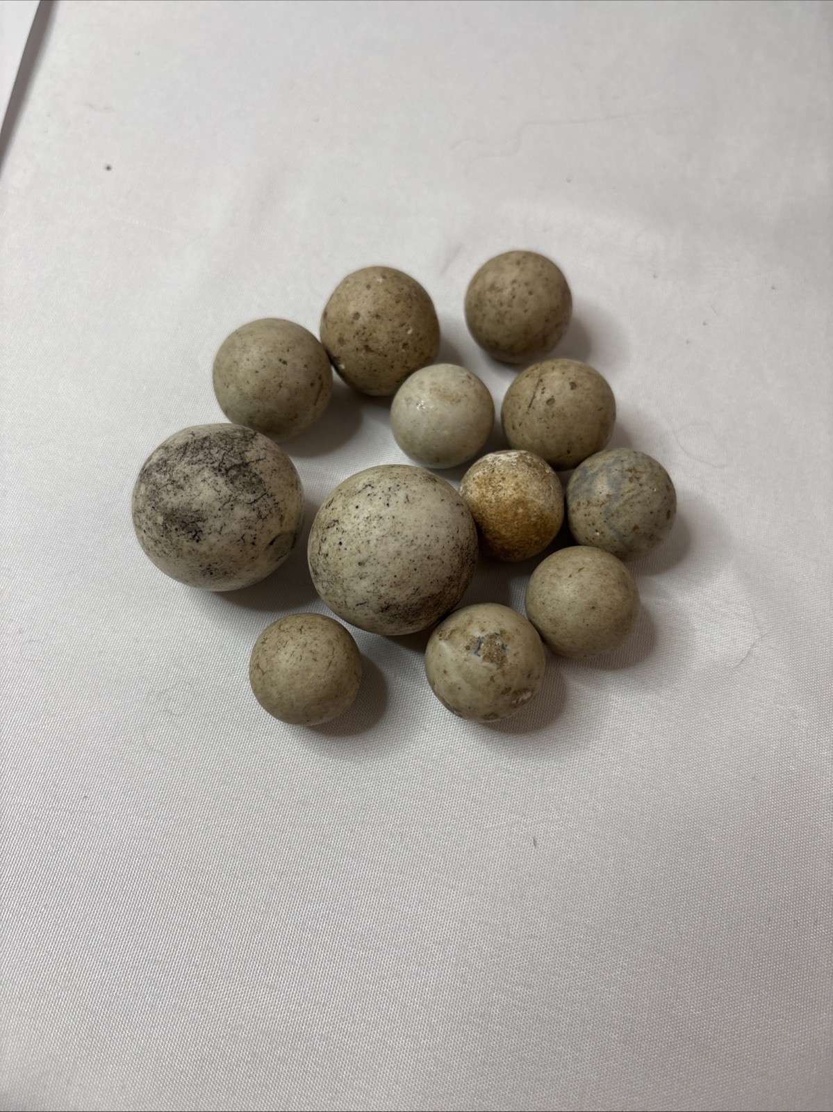 A Lot Of 12 Antique Clay Marbles
