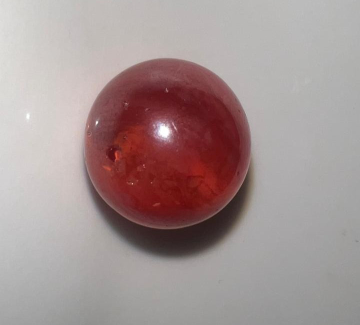 21 vintage handmade glass marbles with colorful swirls and unique patterns.