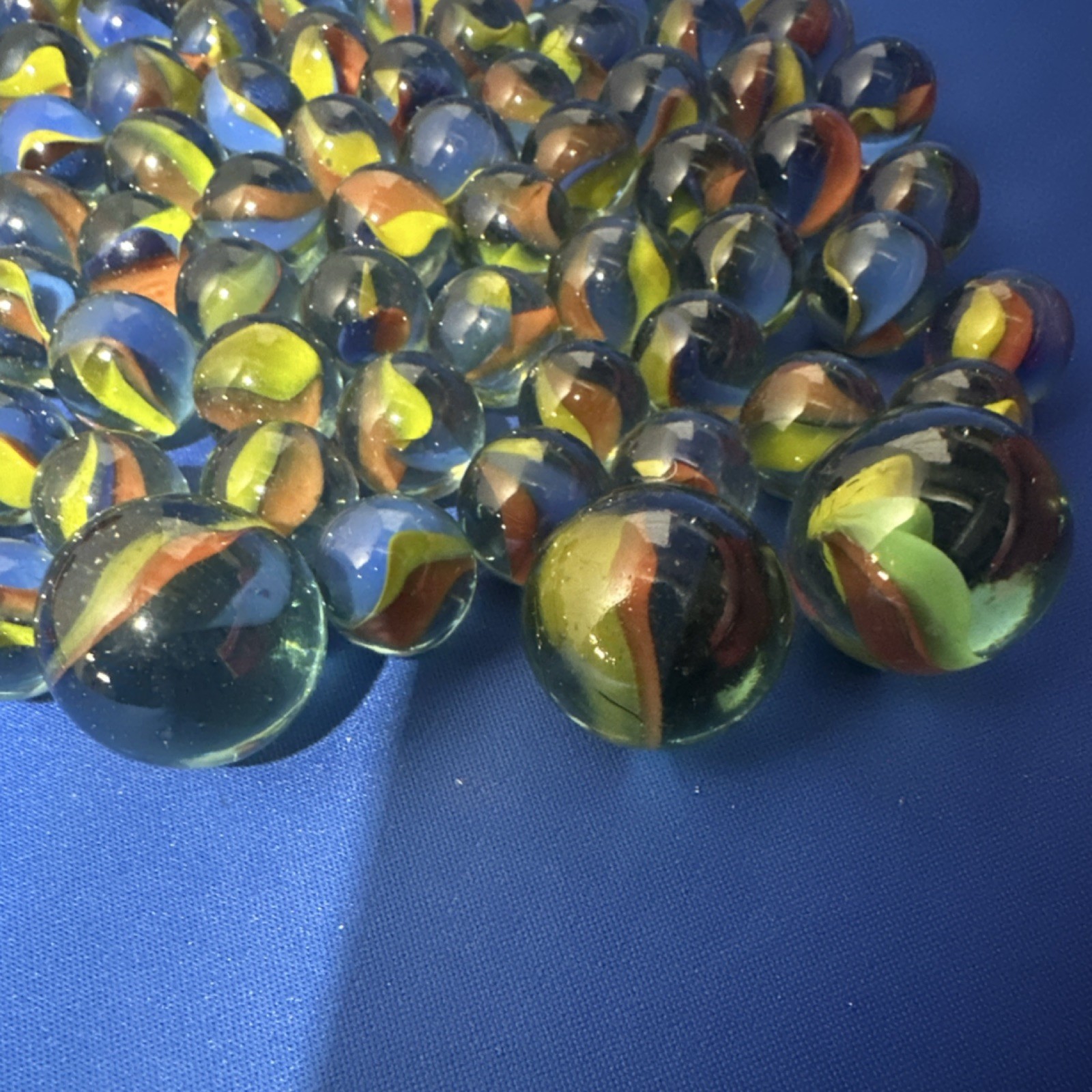 Cat’s Eye Glass Toy Marbles Lot Machine . unknown age