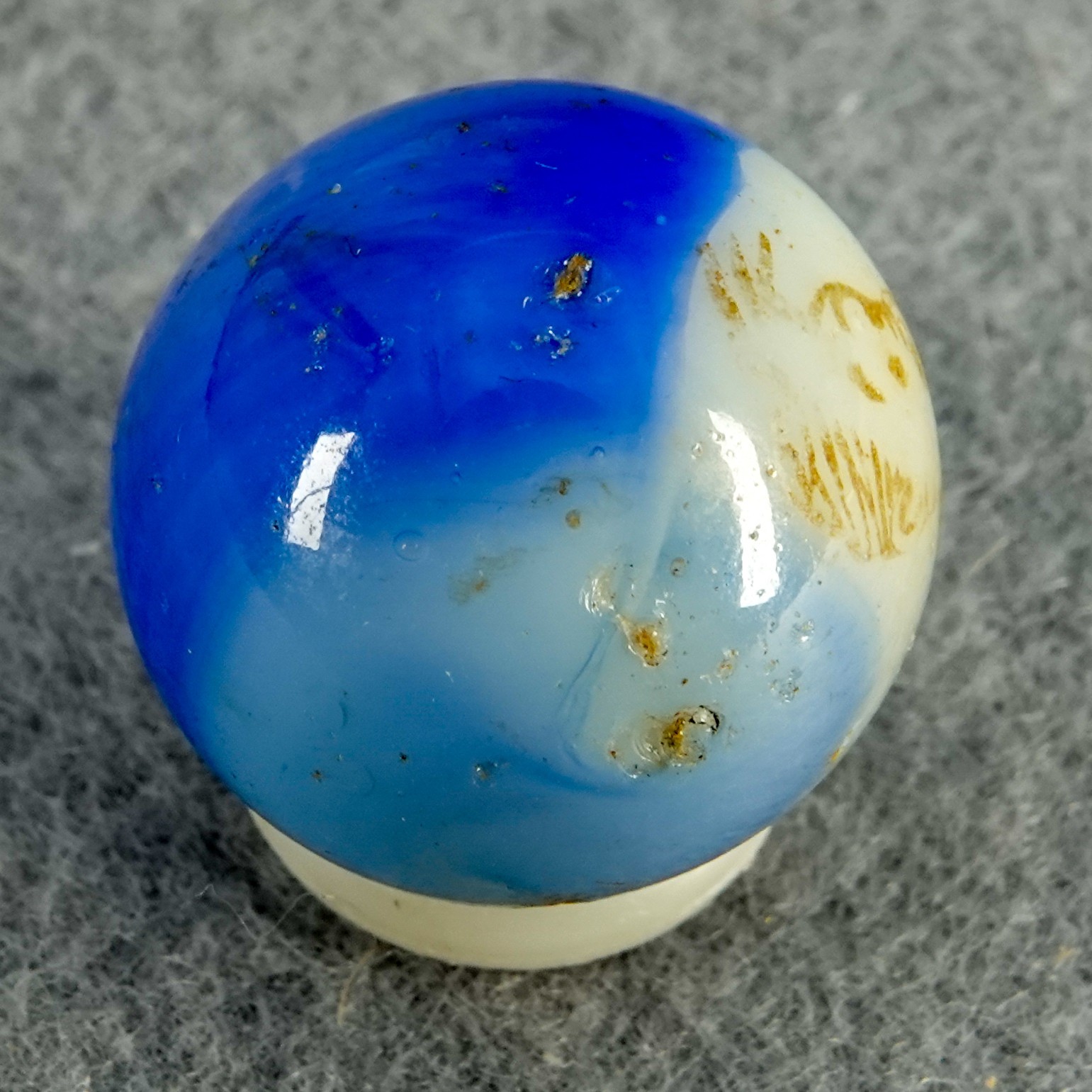 Marbles: PELTIER GLASS COMPANY, Character Marble. Skeezix. 11/16″. NM- (8.2).