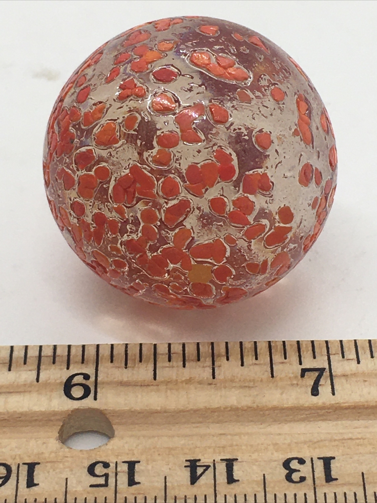 VINTAGE LARGE ART GLASS SHOOTER MARBLE CLEAR GLASS RED SPECKLES 4.25″ AROUND