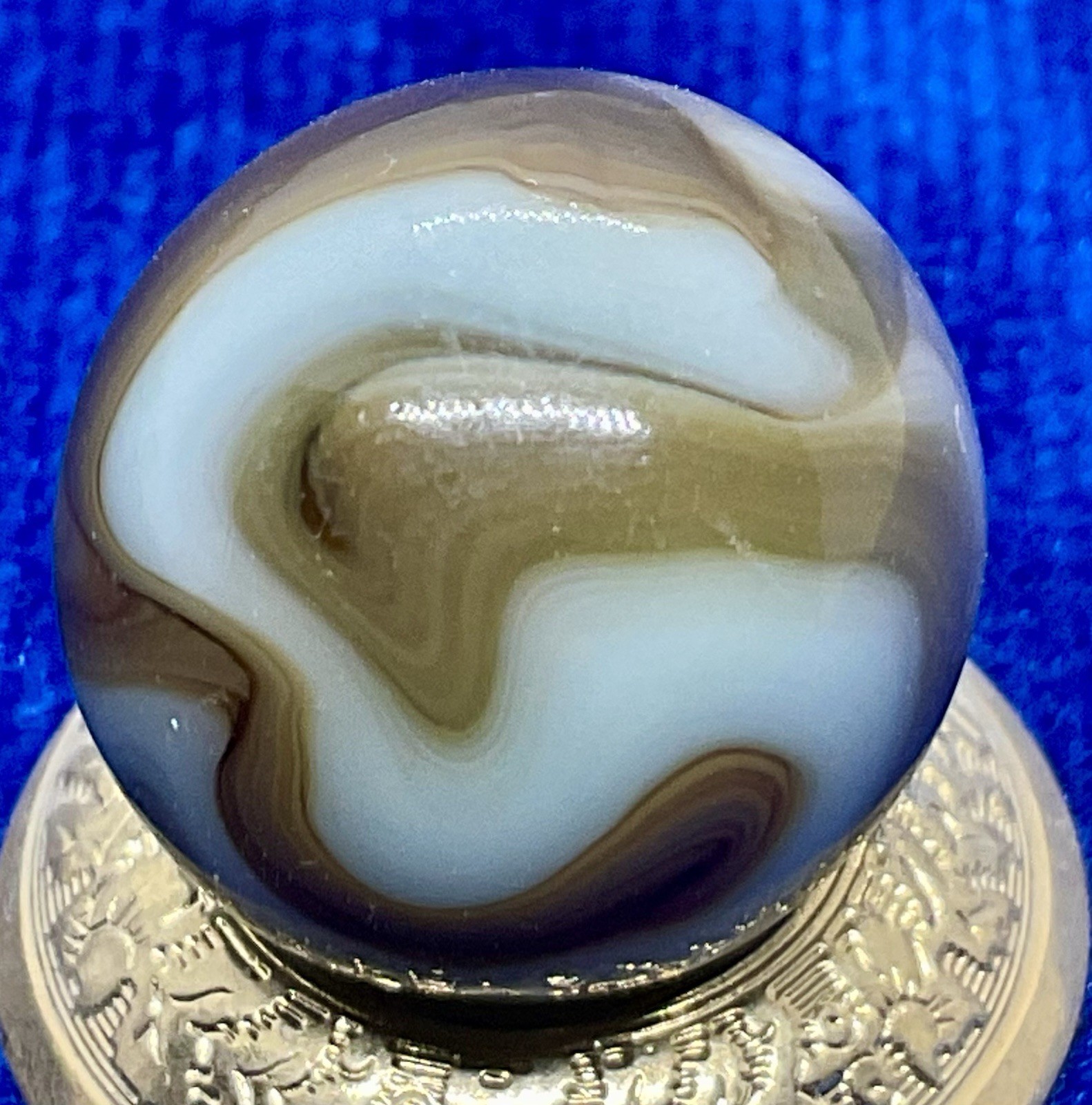 A Vintage Alley Agate “Pistachio” UV Marble. Measures .66” Mint Condition.