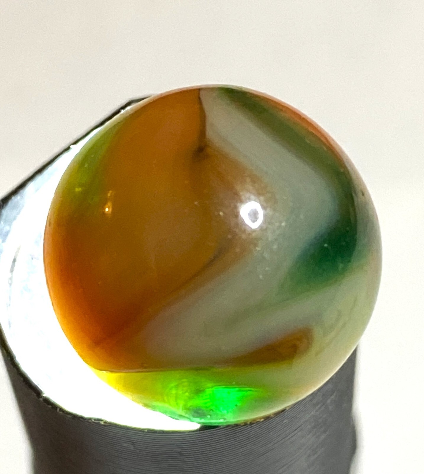 SEAMED WV / CHAMPION / AGATE GREEN GLASS BASED SWIRL .61″ NM+/- M243
