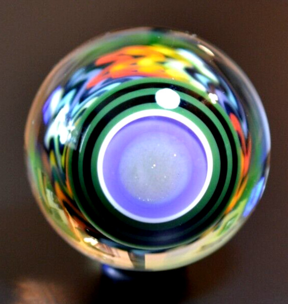 JOSHUA JUSTICE GLASS MARBLE/1.728″-DARK RAINBOW UV-NEON GREEN UNDER BLACKLIGHT