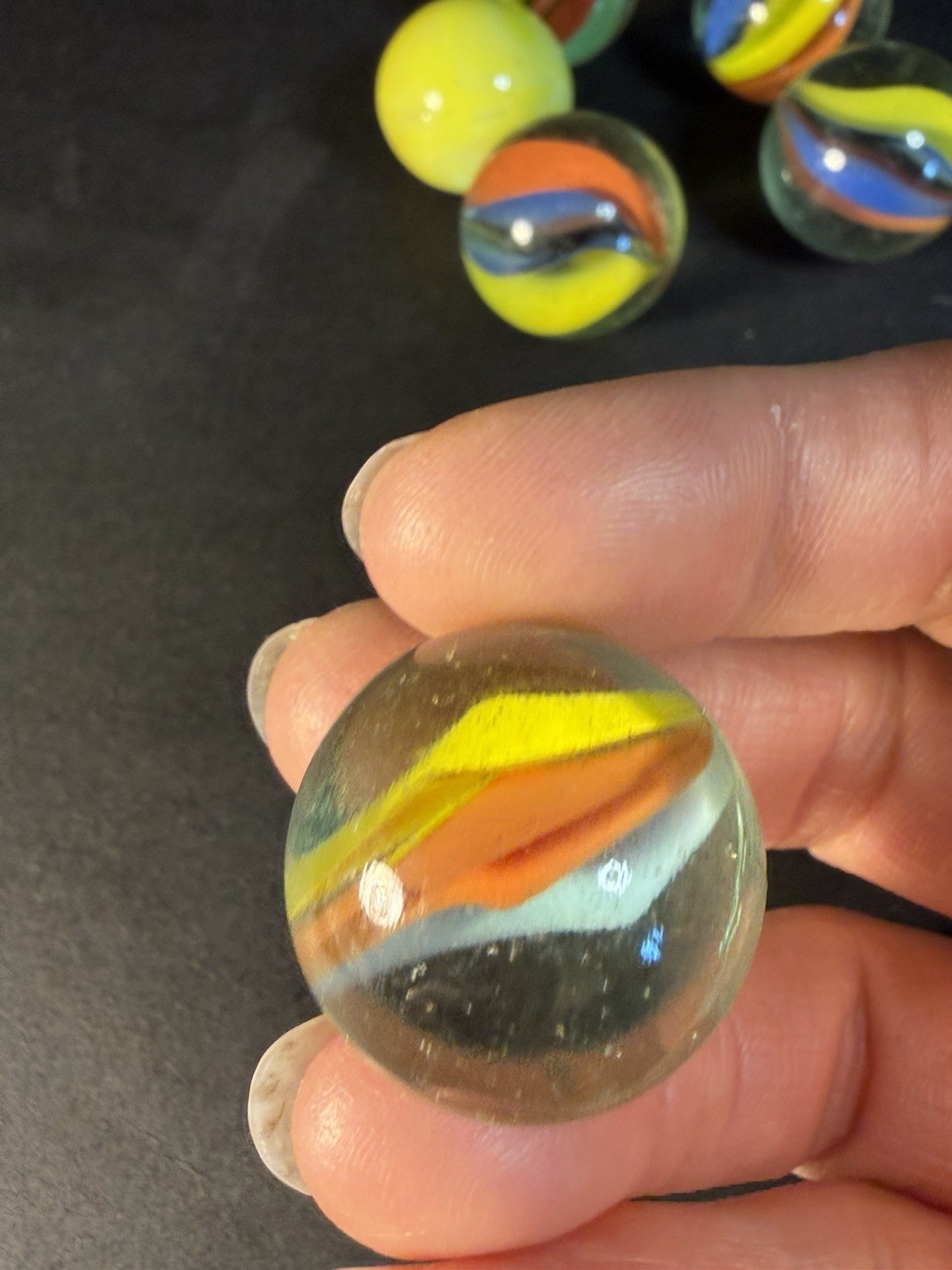 6 Cats Eye 1” Shooter Marbles Plus Two Other Solid Color Marbles