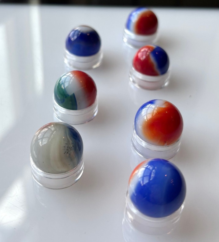 7 VTG Glass Marbles-6 Red White Blue, 1 Red White Green, Approx .57″-.62″ Lot 12