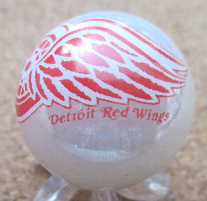 NHL: Detroit Red Wings Logo on a Pearl Jabo Marble #151 .932″ = 23.68mm