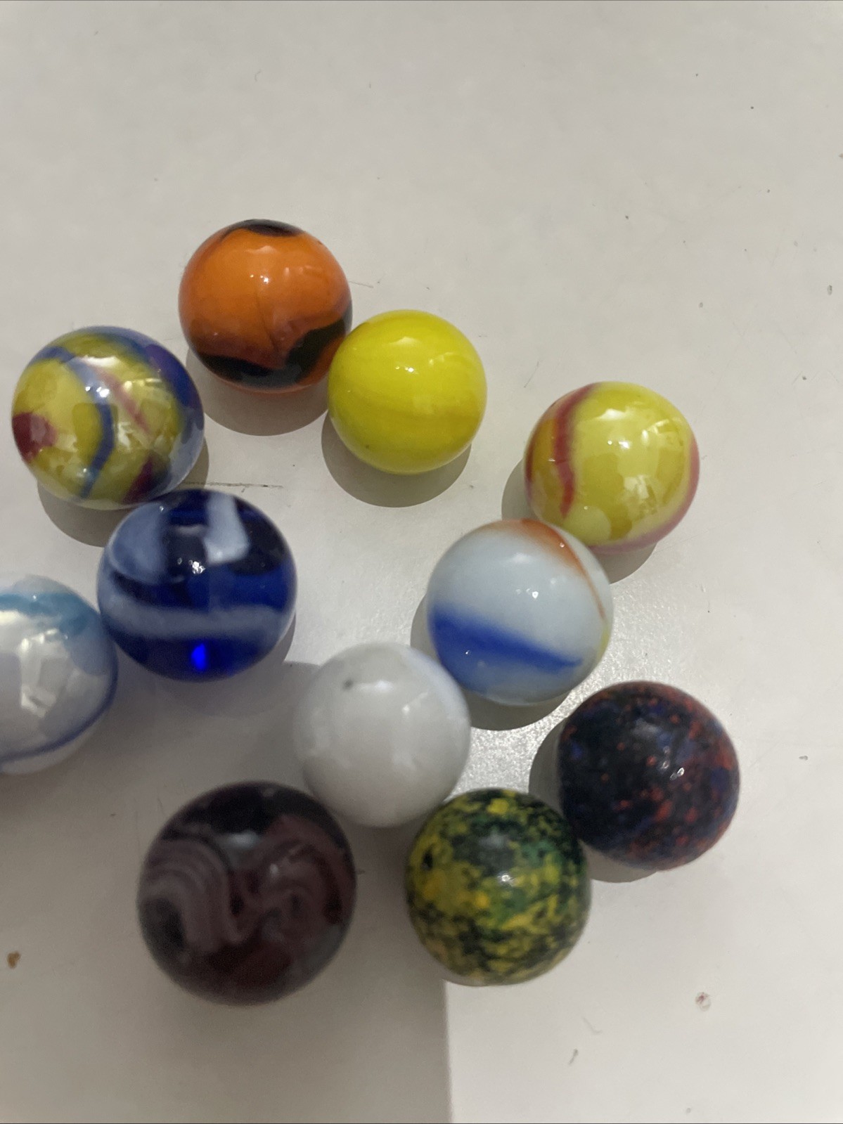 8 Small Marbles And 6 Tiny Marbles