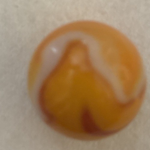 Yellow orange & white swirl machine made marble collectible