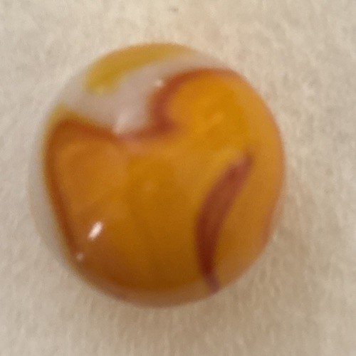 Yellow orange & white swirl machine made marble collectible